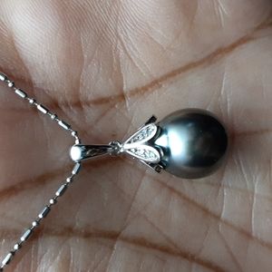 925 genuine Tahitian gray pearl and untreated natural white zircons.  FINAL DROP